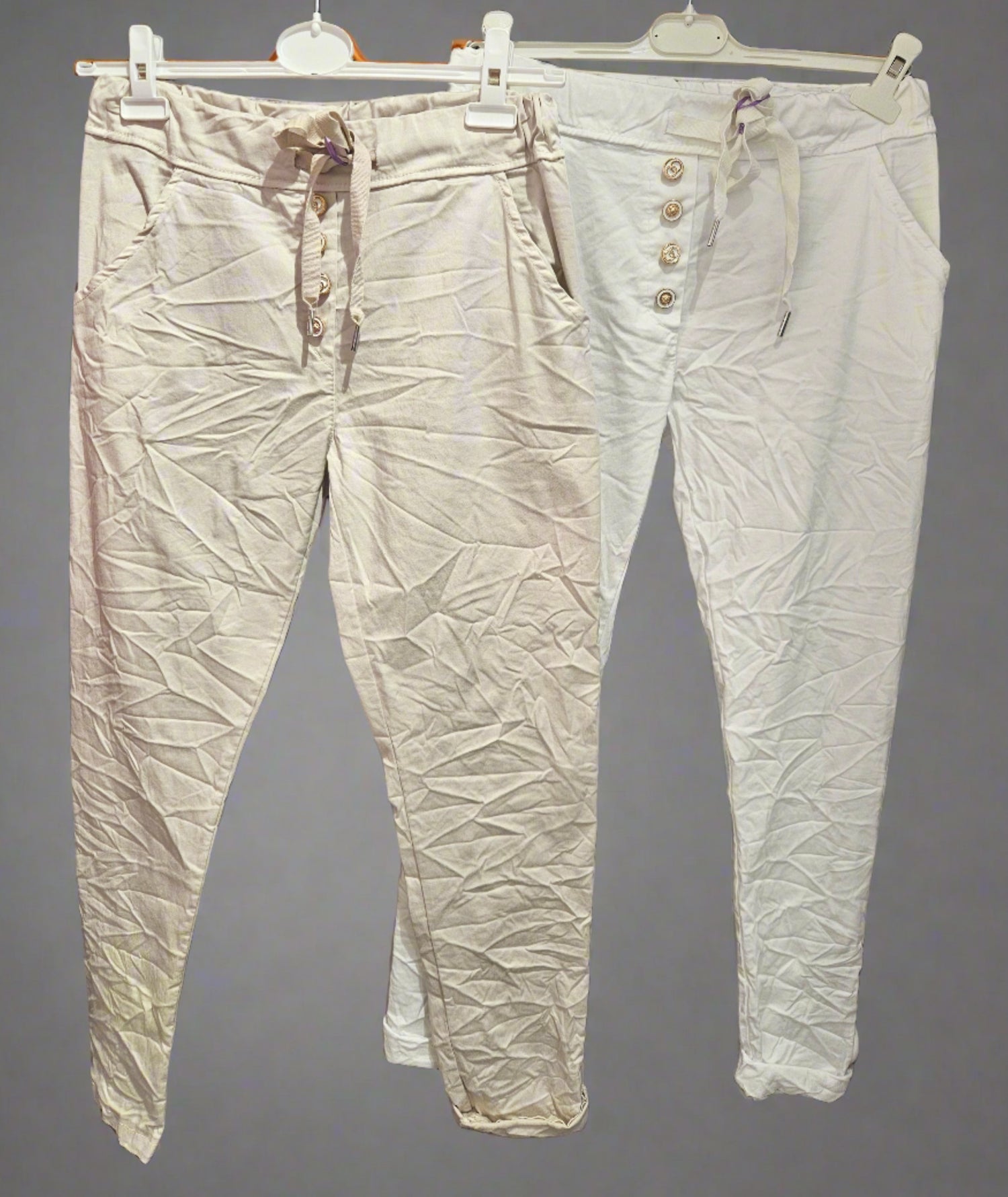 Joggers with drawstring waist and gold button detail