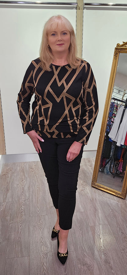 Libra Black and Gold Geo print round neck top with long sleeve and zip detail