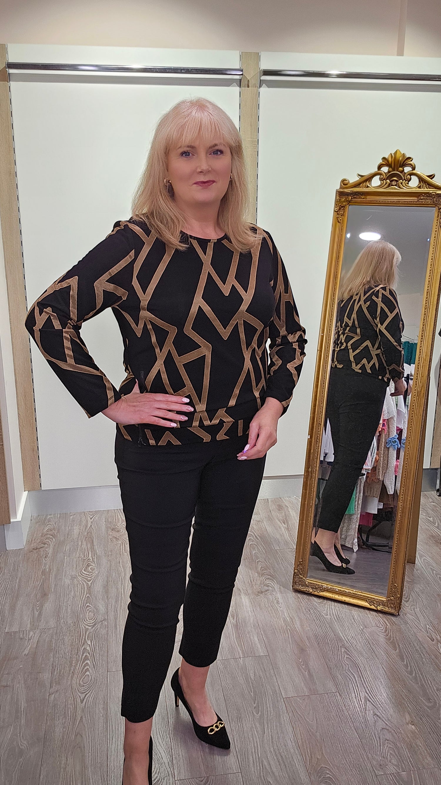 Libra Black and Gold Geo print round neck top with long sleeve and zip detail