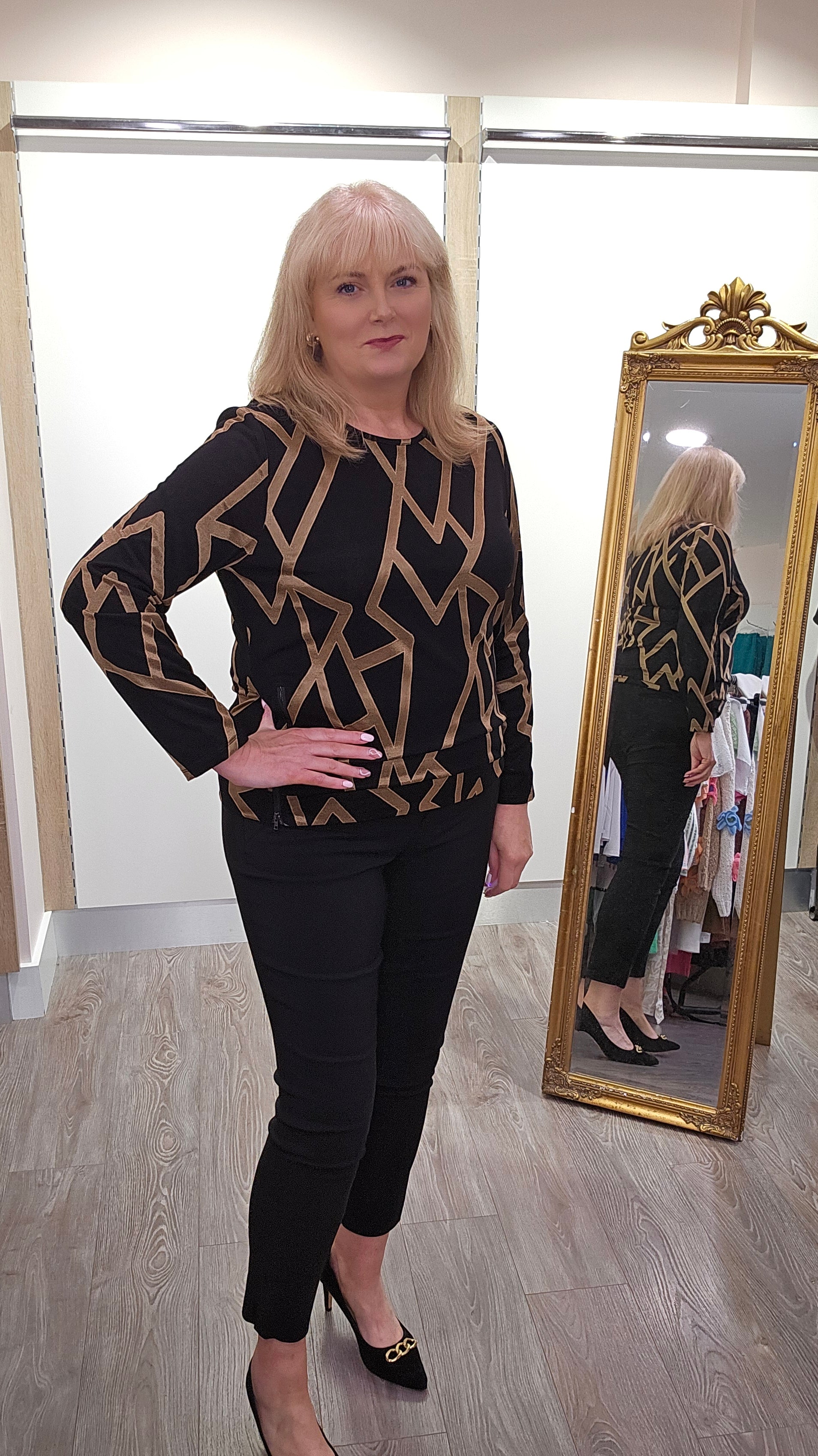 Libra Black and Gold Geo print round neck top with long sleeve and zip detail