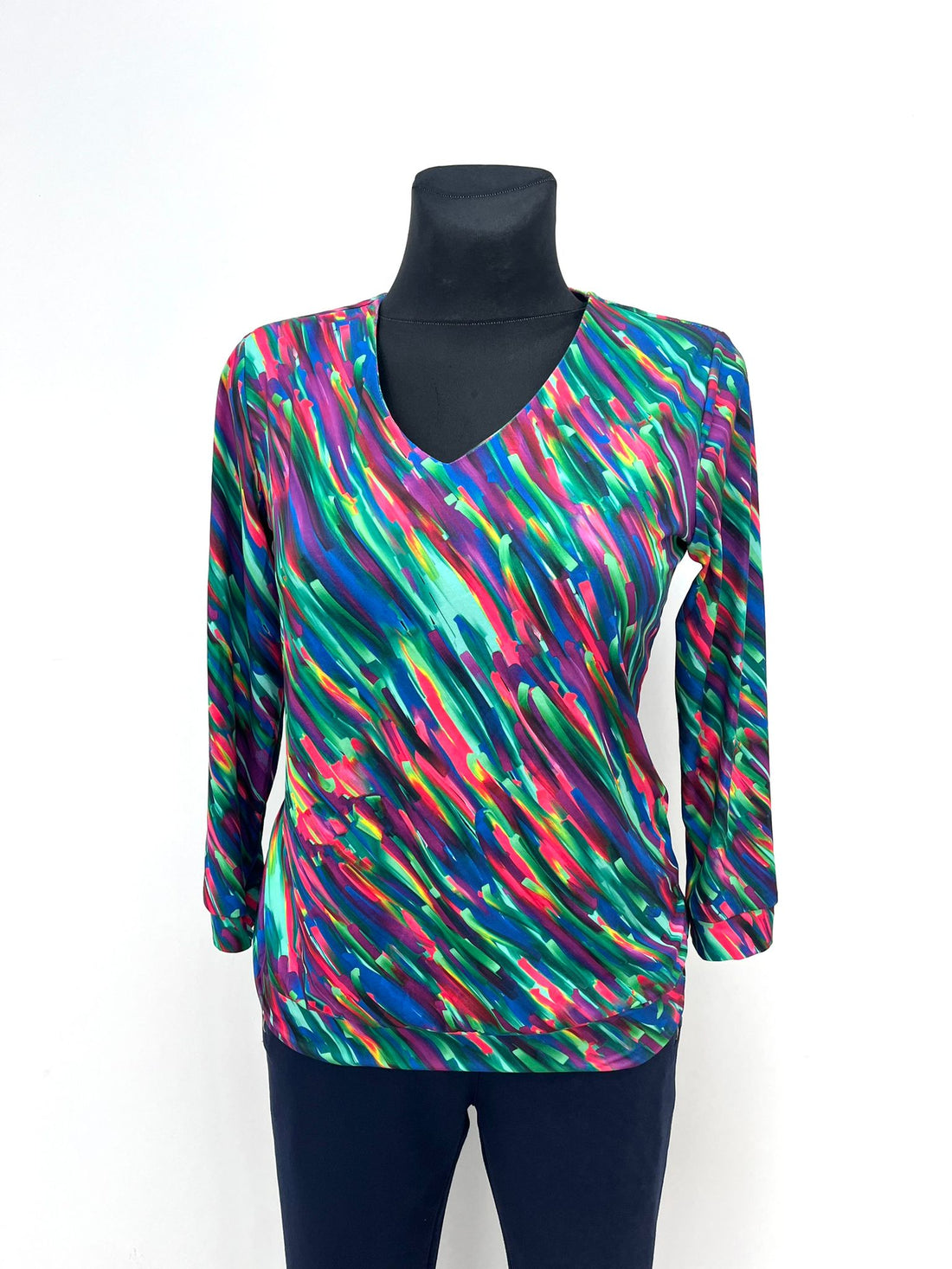 Yew V neck top with waistband in vibrant paint stroke print. Yew 8