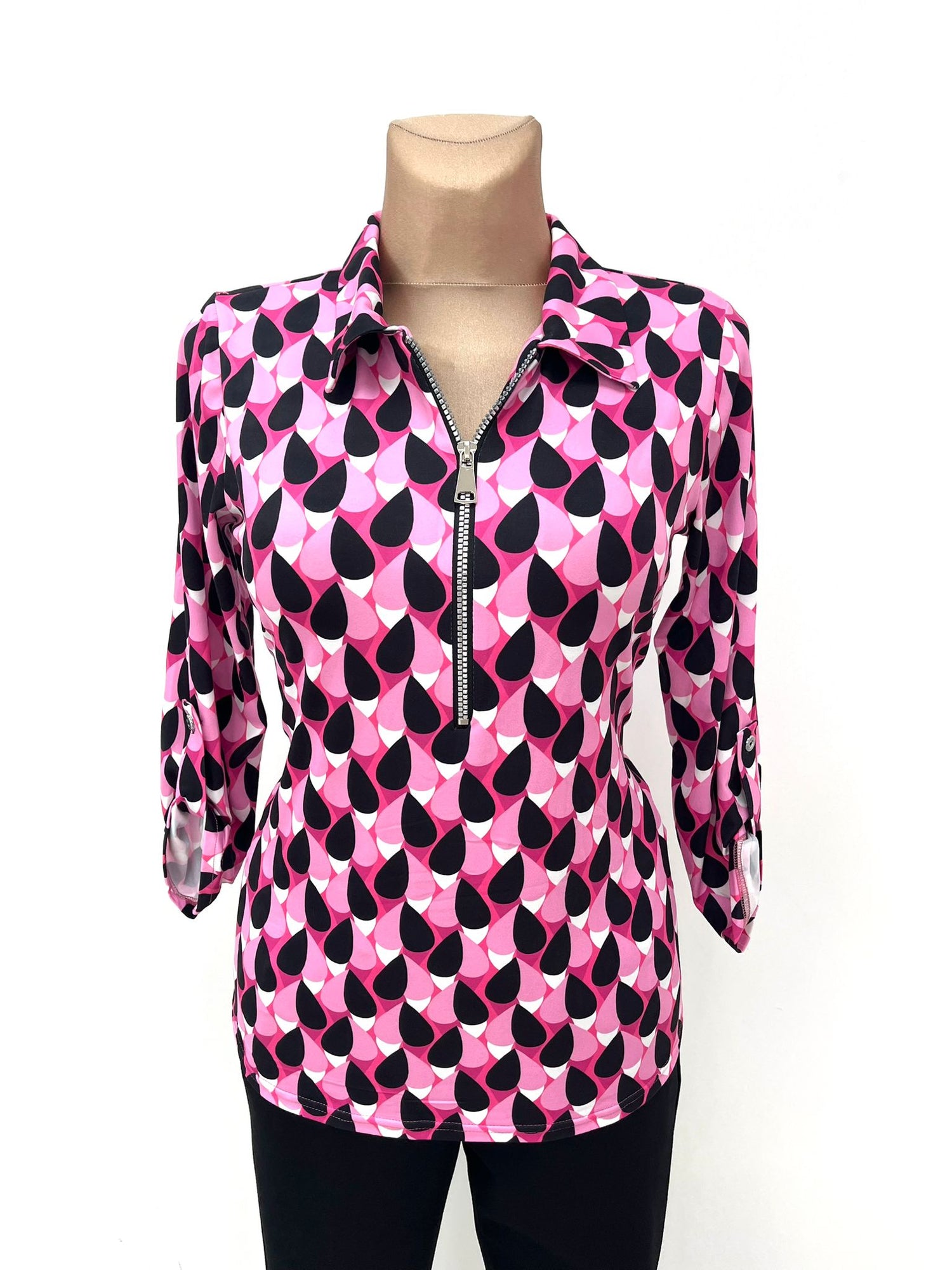 Yew 1/4 zip Collar style Pink and Black print . Yew 5