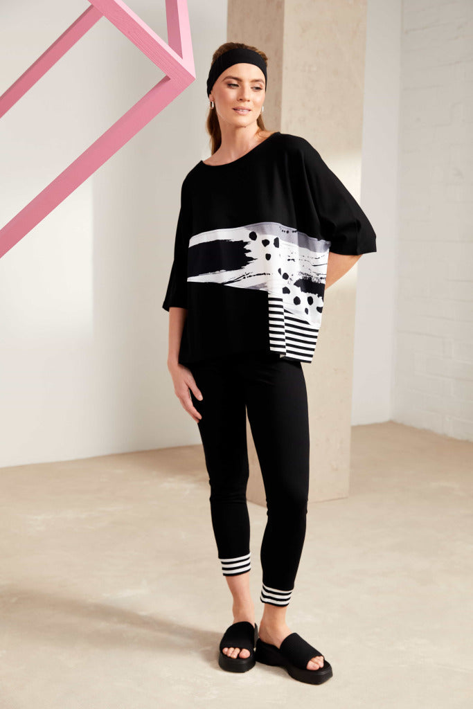 Naya Round neck top with stripe and print panels in black and white Nas25128