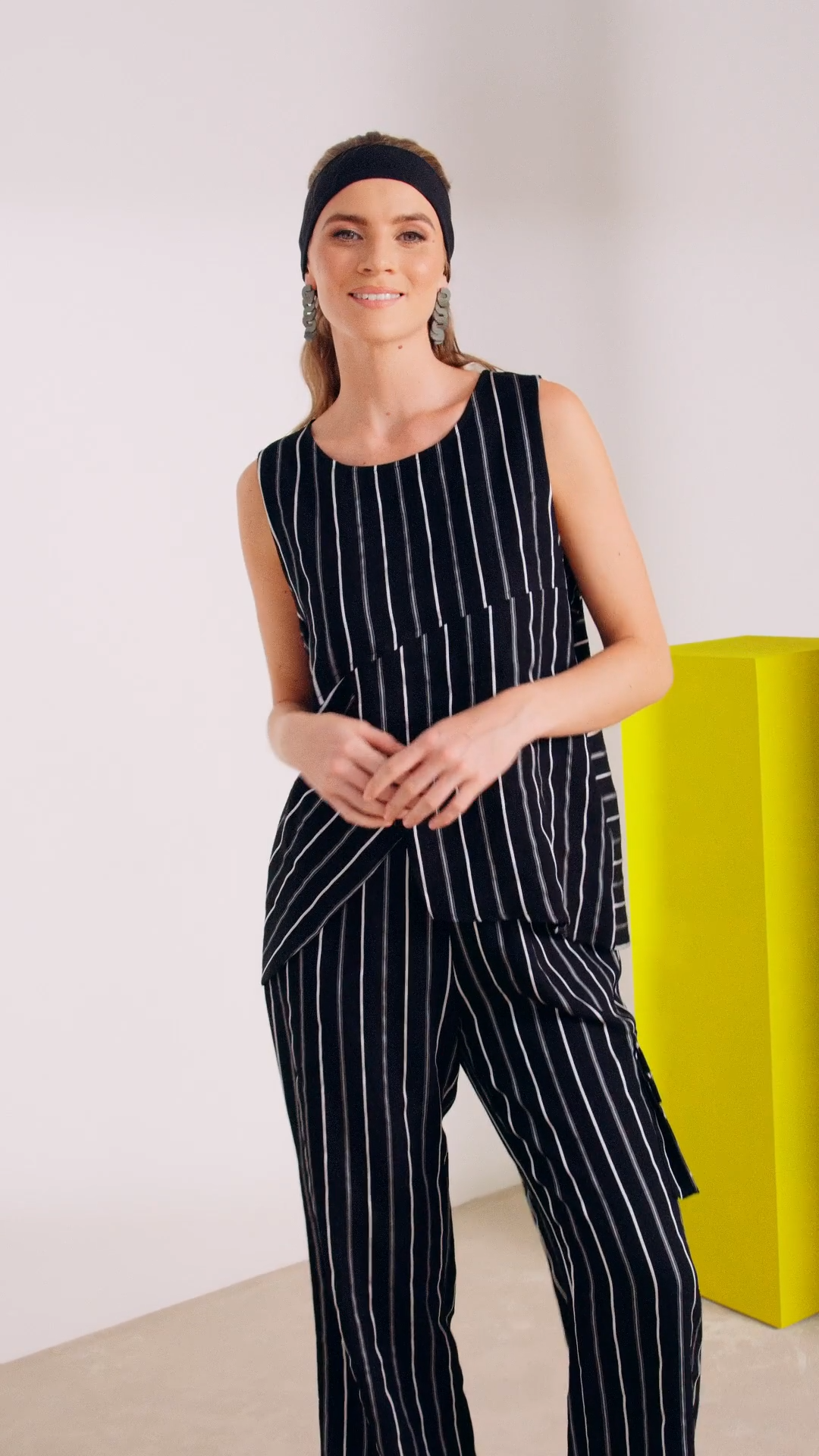 Naya Stripped sleeveless top with curved hemline  Nas25336